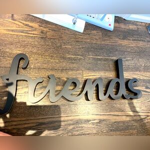 Friends hanging sign
